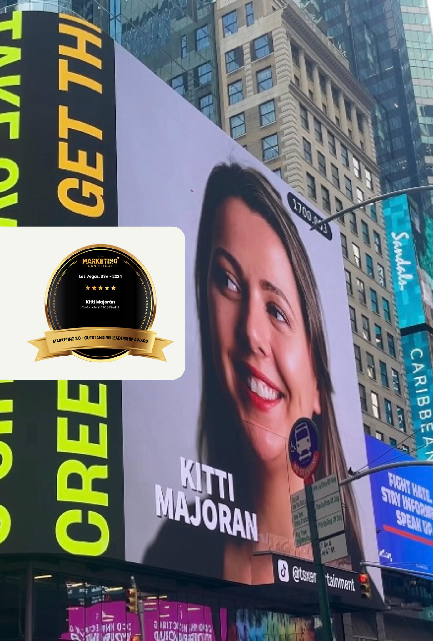 Electronic billboard with Kitti Majoran's portrait and name on Times Square (NYC) with the Marketing 2.0 award sleeve inserted on the left of the picture.
