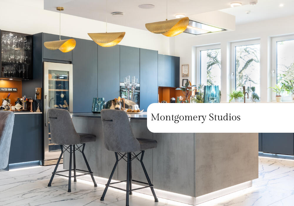 Inside a high-end kitchen photographed by Montgomery Studios. The Montgomery Studios logo is also featured in the bottom right corner of the photo.