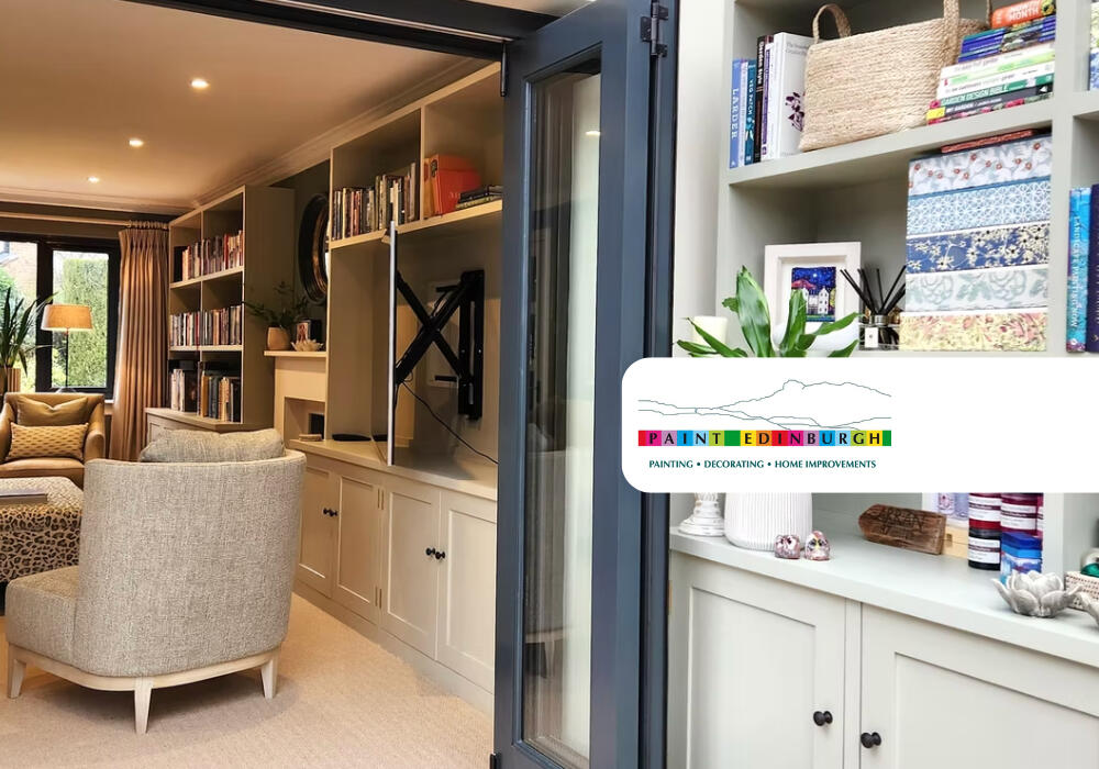 Inside a beautiful living room freshly painted and decorated by Paint Edinburgh. The Paint Edinburgh logo is also featured in the top left corner of the photo.